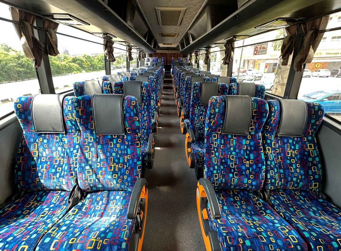 Spacious seating inside a Tliner Economy Class coach